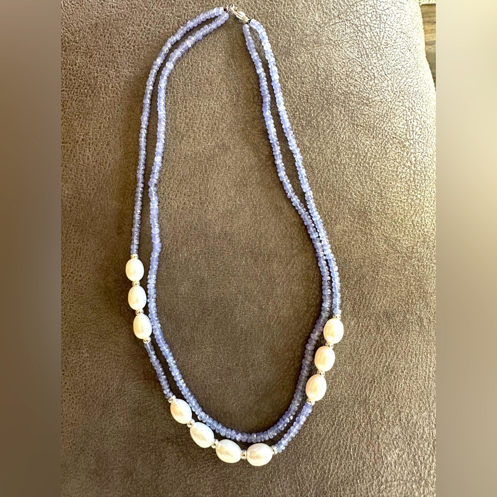 Women’s double loop pearl and lavender bead necklace.